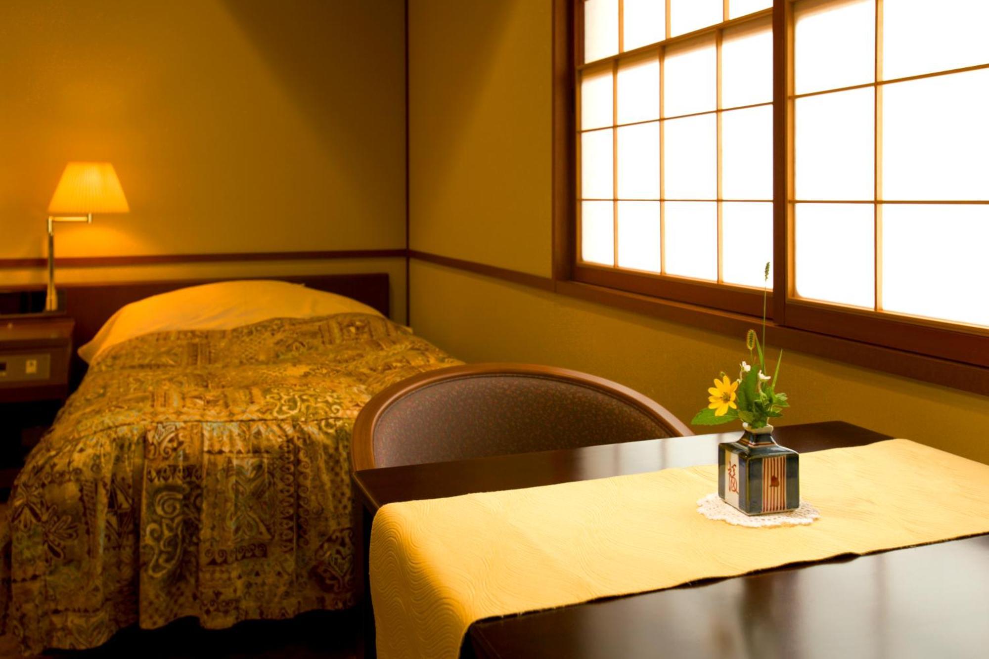 Hotel Tachibanaya Tsuruoka Zimmer foto
